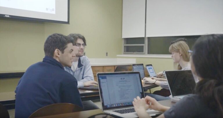Members of F.O.R.M. Consulting prepare to help first-generation college students apply to college. IMAGE: CORY STEINLE