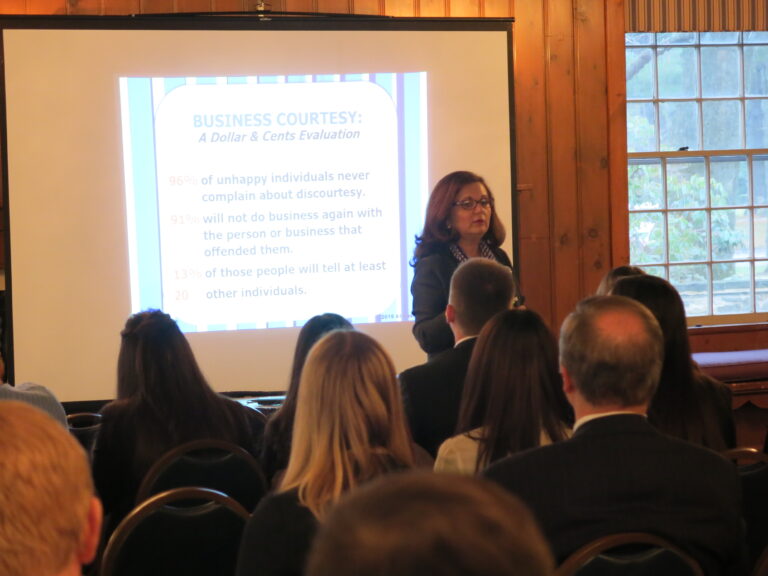 Social skills in a business setting practiced as part of special etiquette dinner